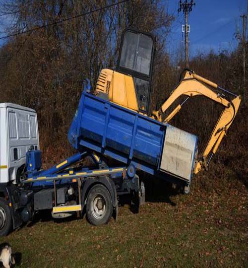 Transportation of a broken earthmoving machine for repair to a service center
